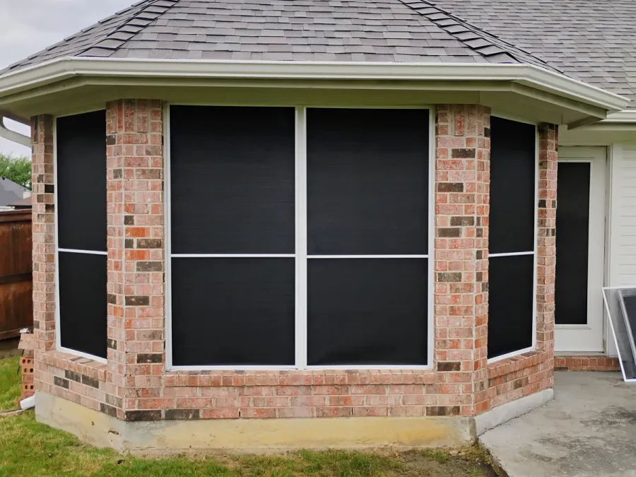 Same bay window after solar screens were installed
