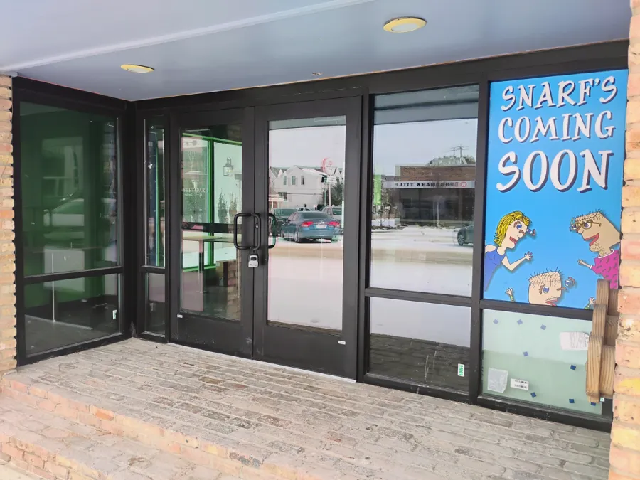 Finished storefront with doors, sidelites and transoms