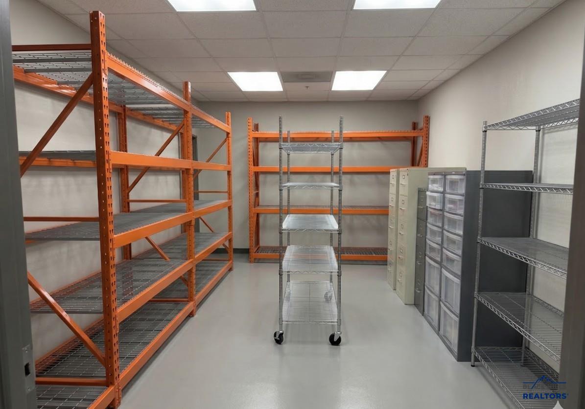 Storage room lined with metal shelving
