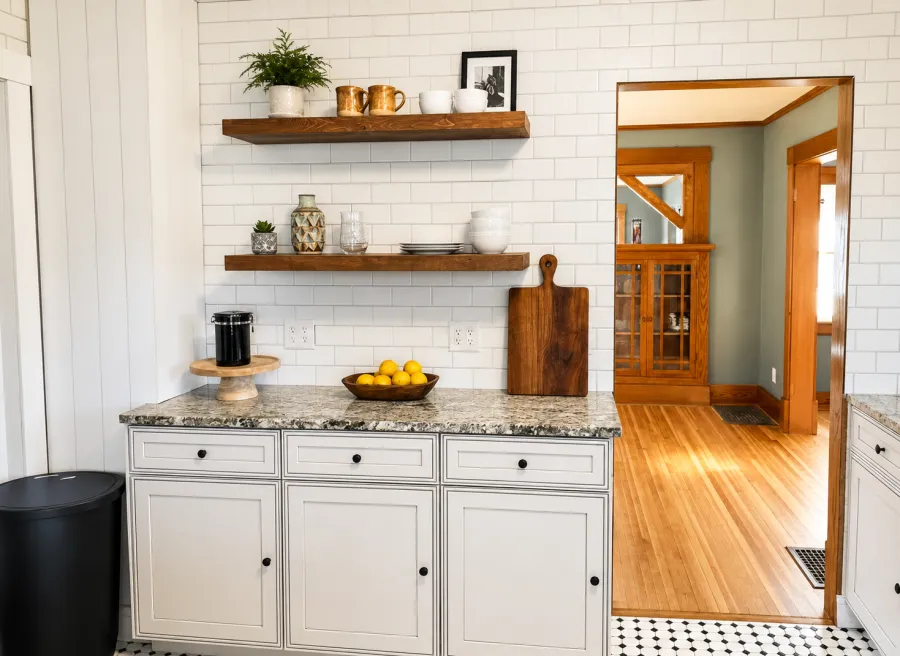 Kitchen open shelving against white tile