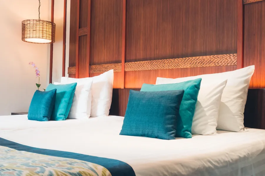 Tidy bedroom interior with fresh linens
