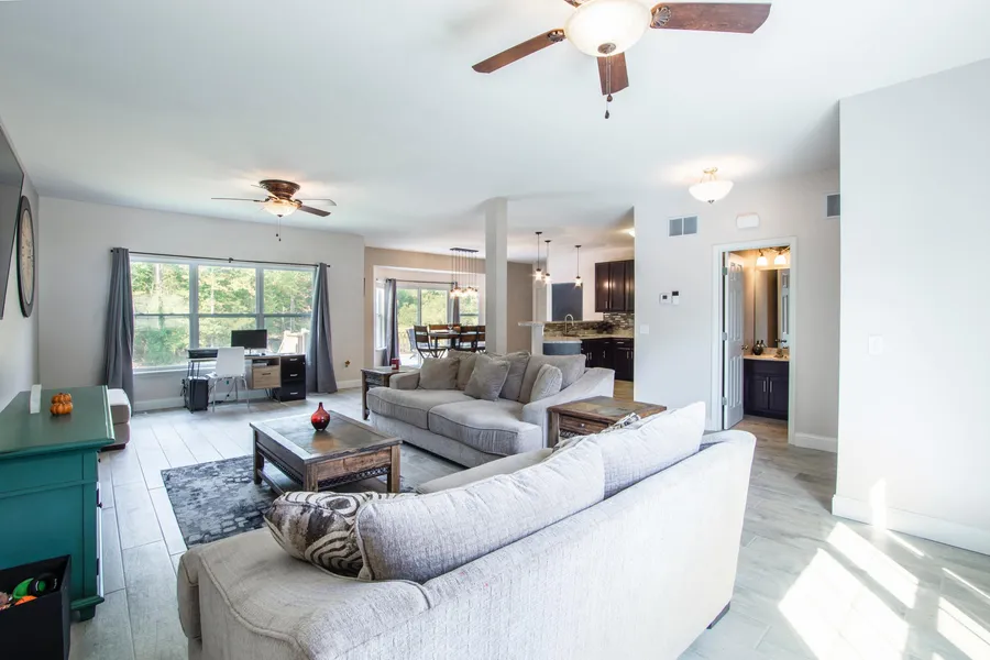 Well-lit living room and conversation space