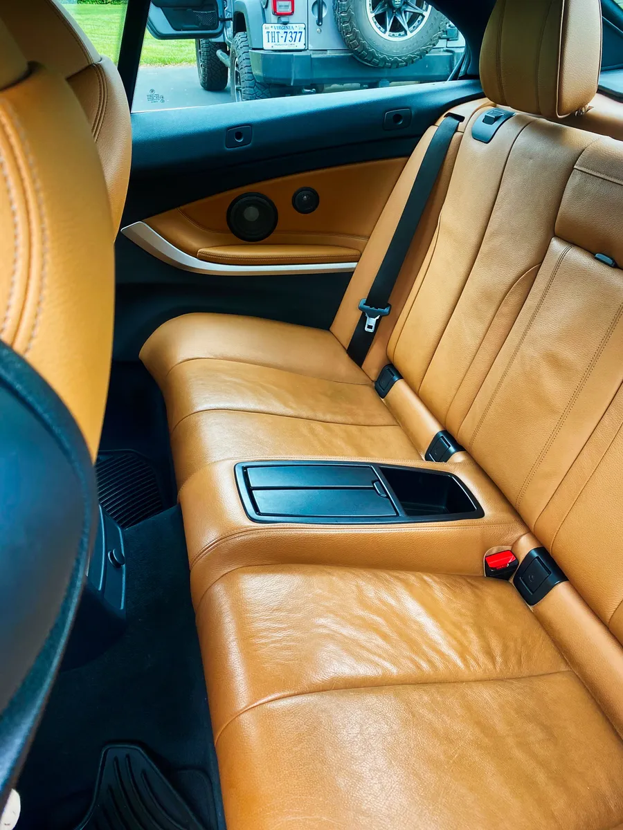 Same BMW rear seats after the full detail