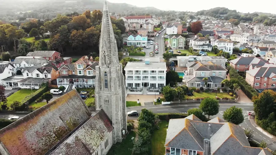 Aerial view of the hotel beside the church spire at The Fig Tree, Shanklin