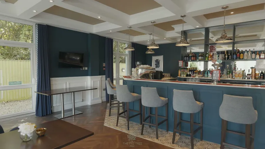 Lounge bar with stools and bifold doors at The Fig Tree, Shanklin