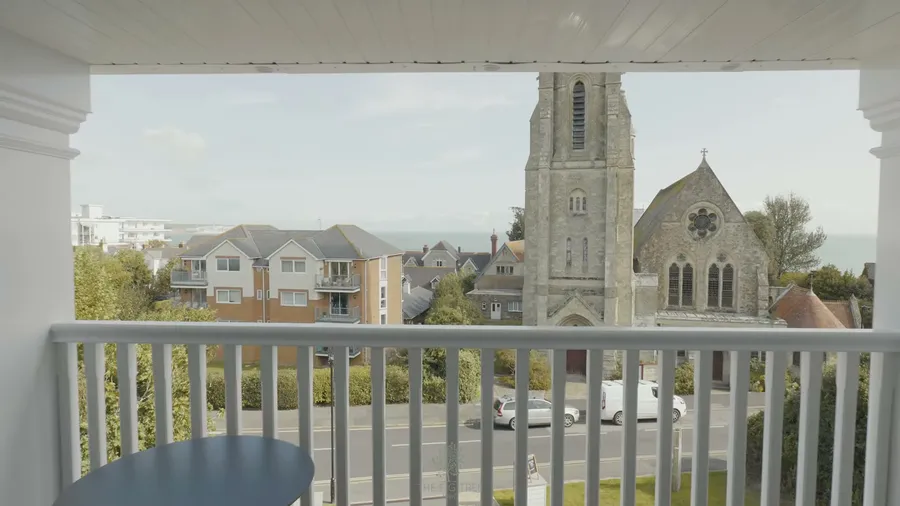 Balcony view to the church spire at The Fig Tree, Shanklin