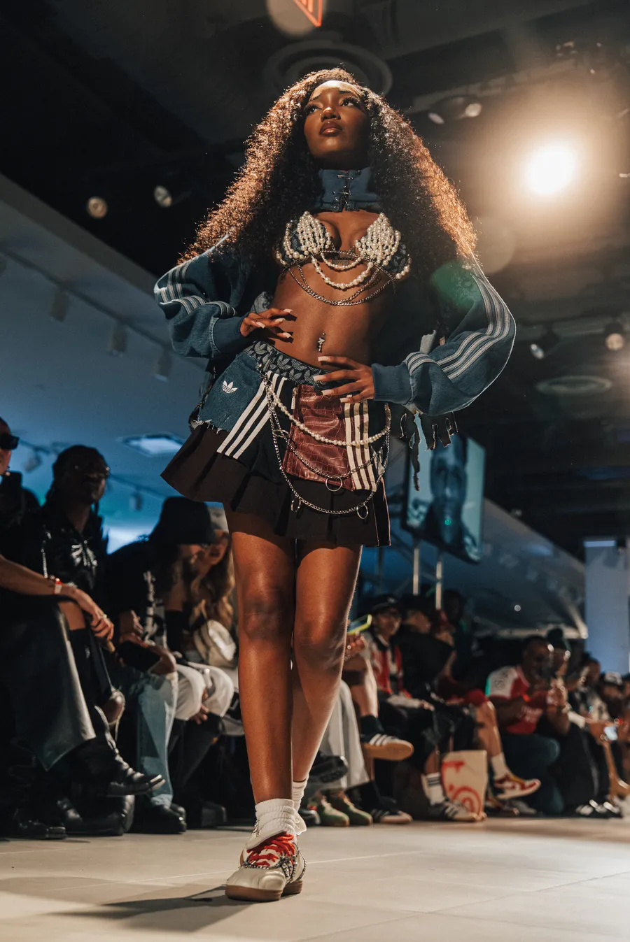 Model walking under the spotlights