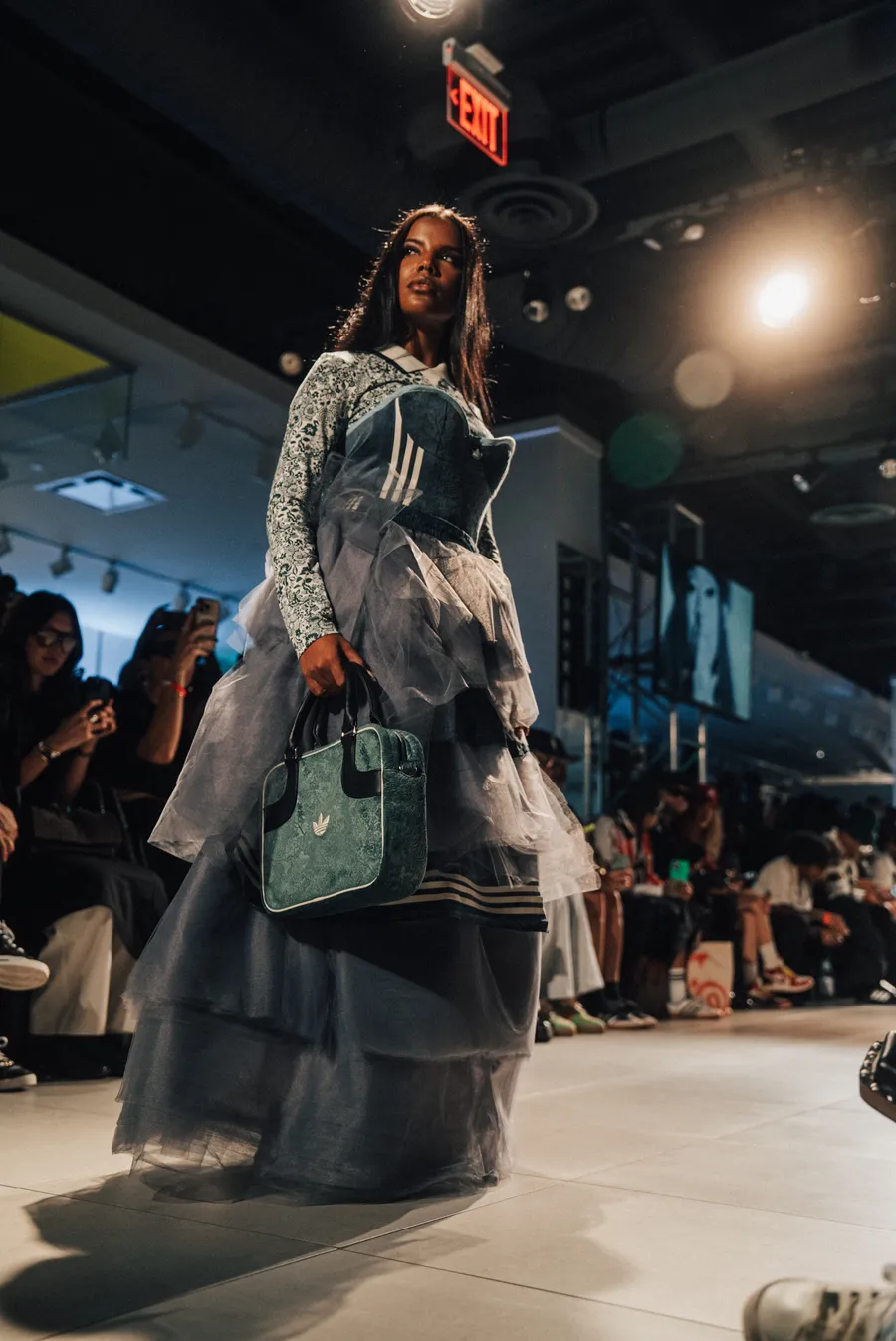 Model in a layered look on the runway
