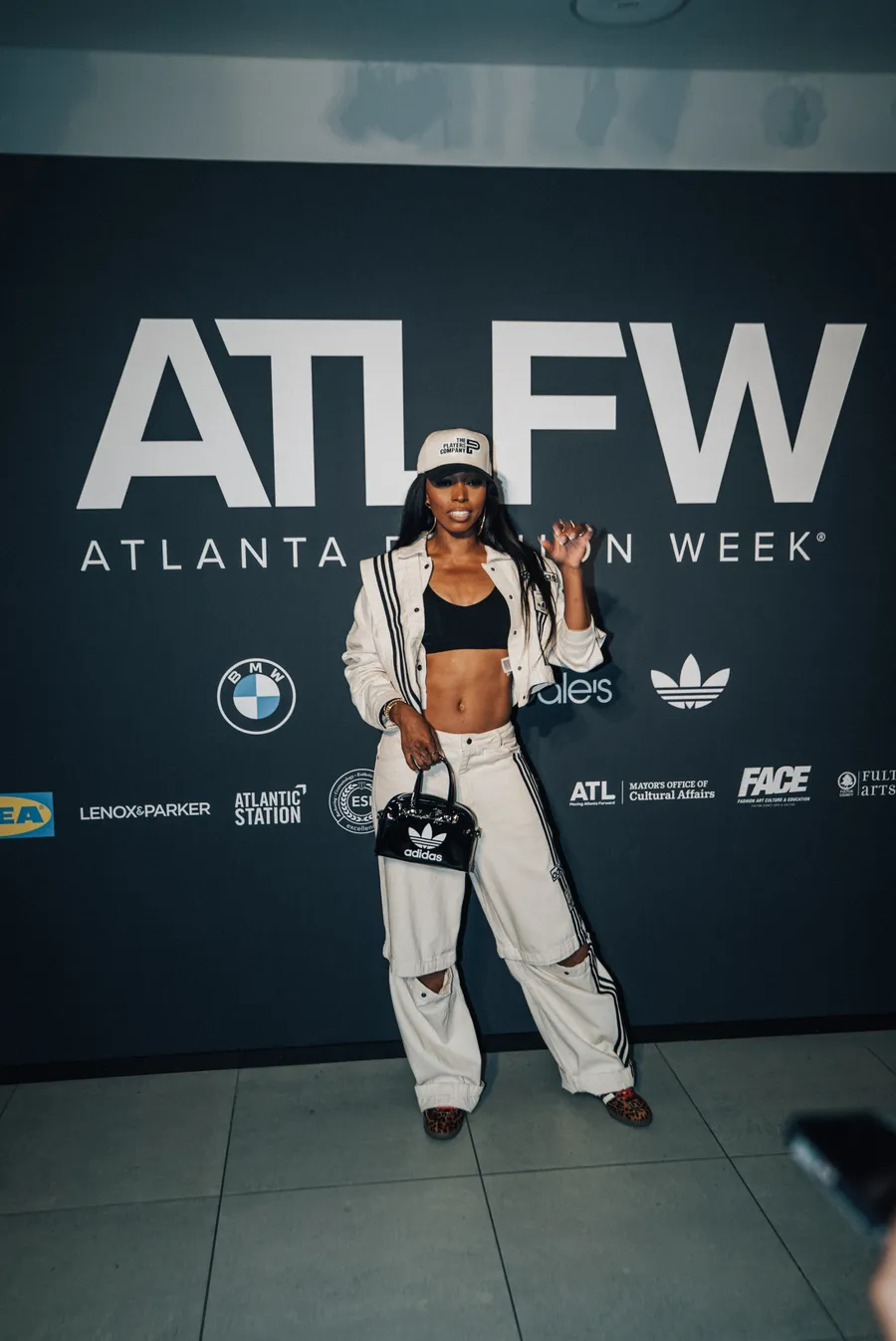 Guest on the Atlanta Fashion Week step and repeat