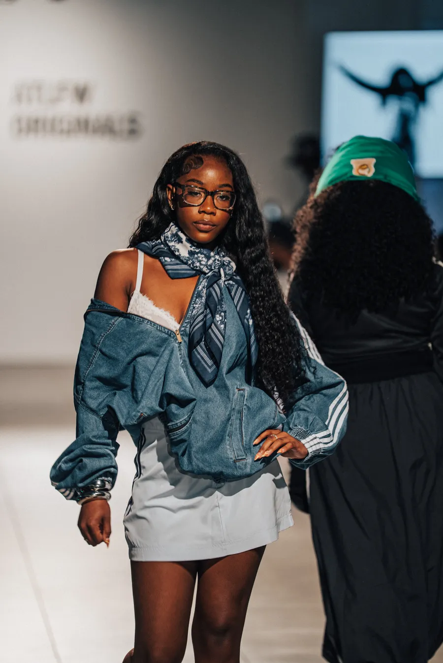 Model in an oversized denim jacket