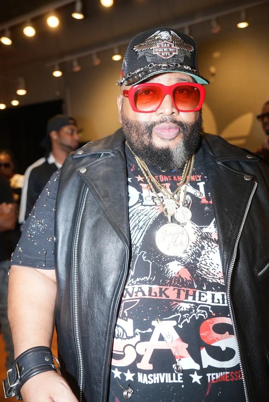 Guest in red sunglasses and a leather vest