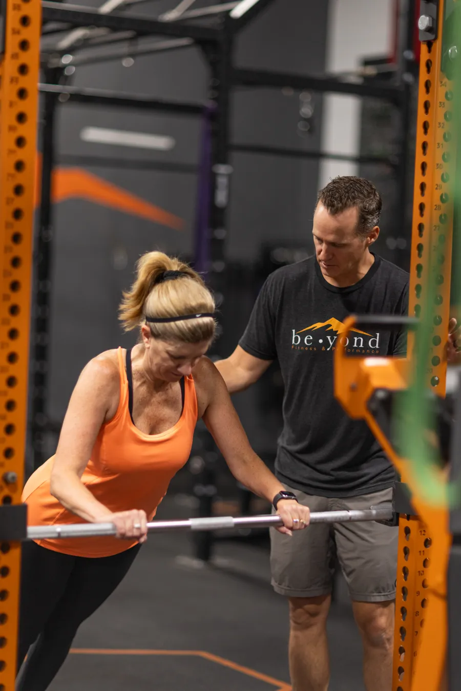 Paula, 60, being coached on a lift