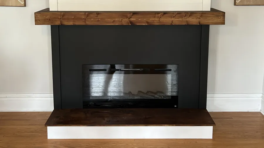 Fireplace with a wood mantel
