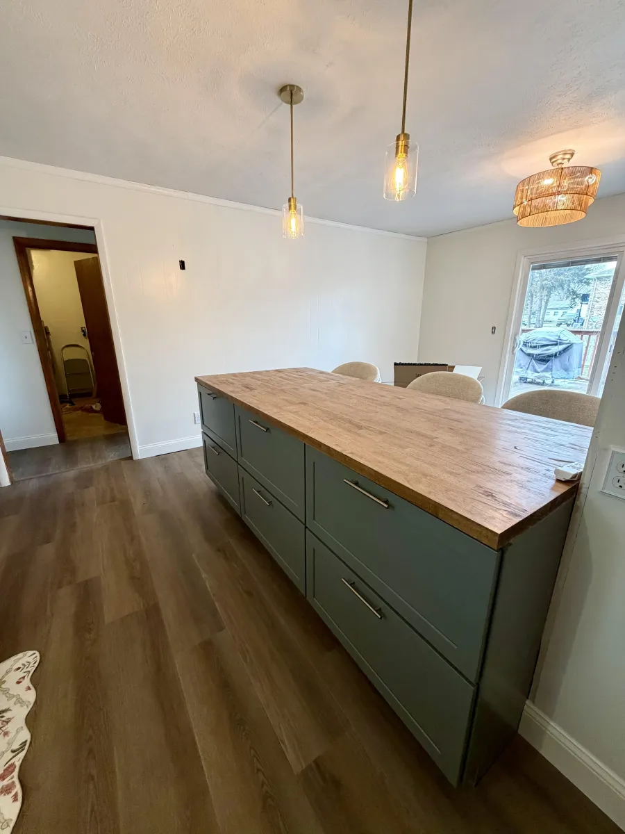 Finished kitchen with a wood island