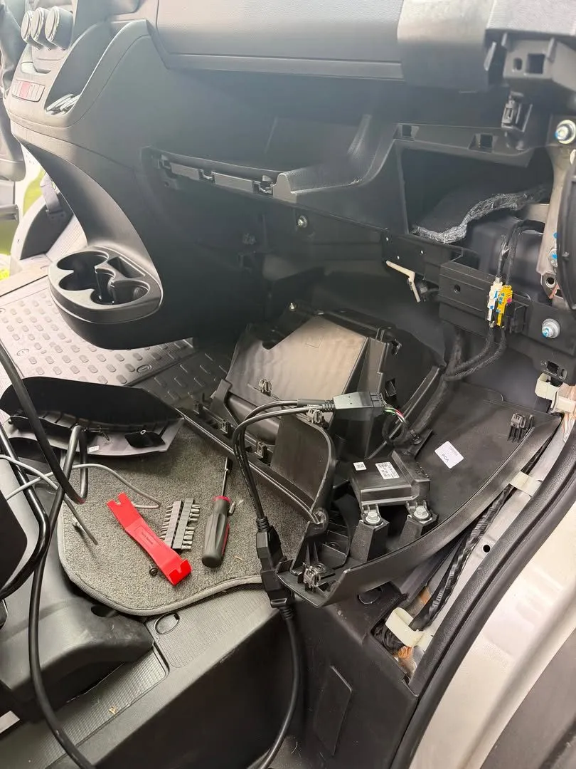 Vehicle dashboard taken apart during automotive lock work