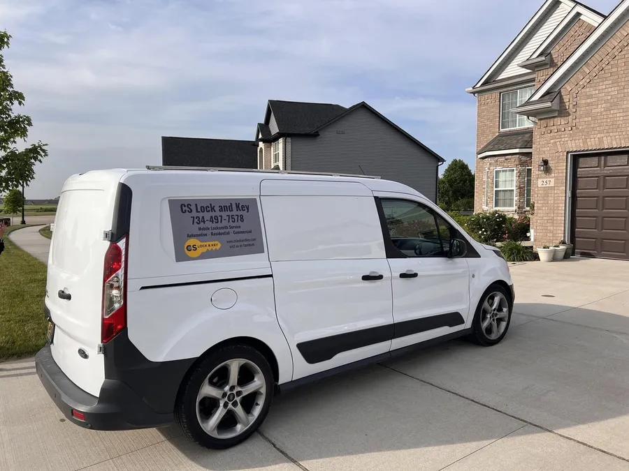 CS Lock and Key van parked in a residential driveway