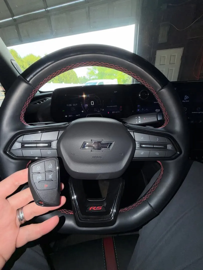 Chevrolet smart key held at the steering wheel