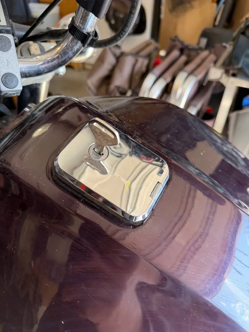 Key in a motorcycle gas cap lock