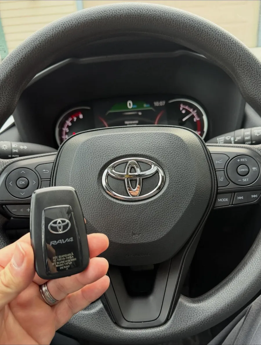 Toyota smart key at the steering wheel