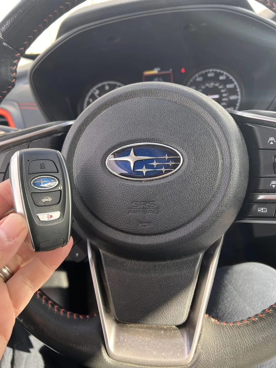 Subaru smart key at the steering wheel