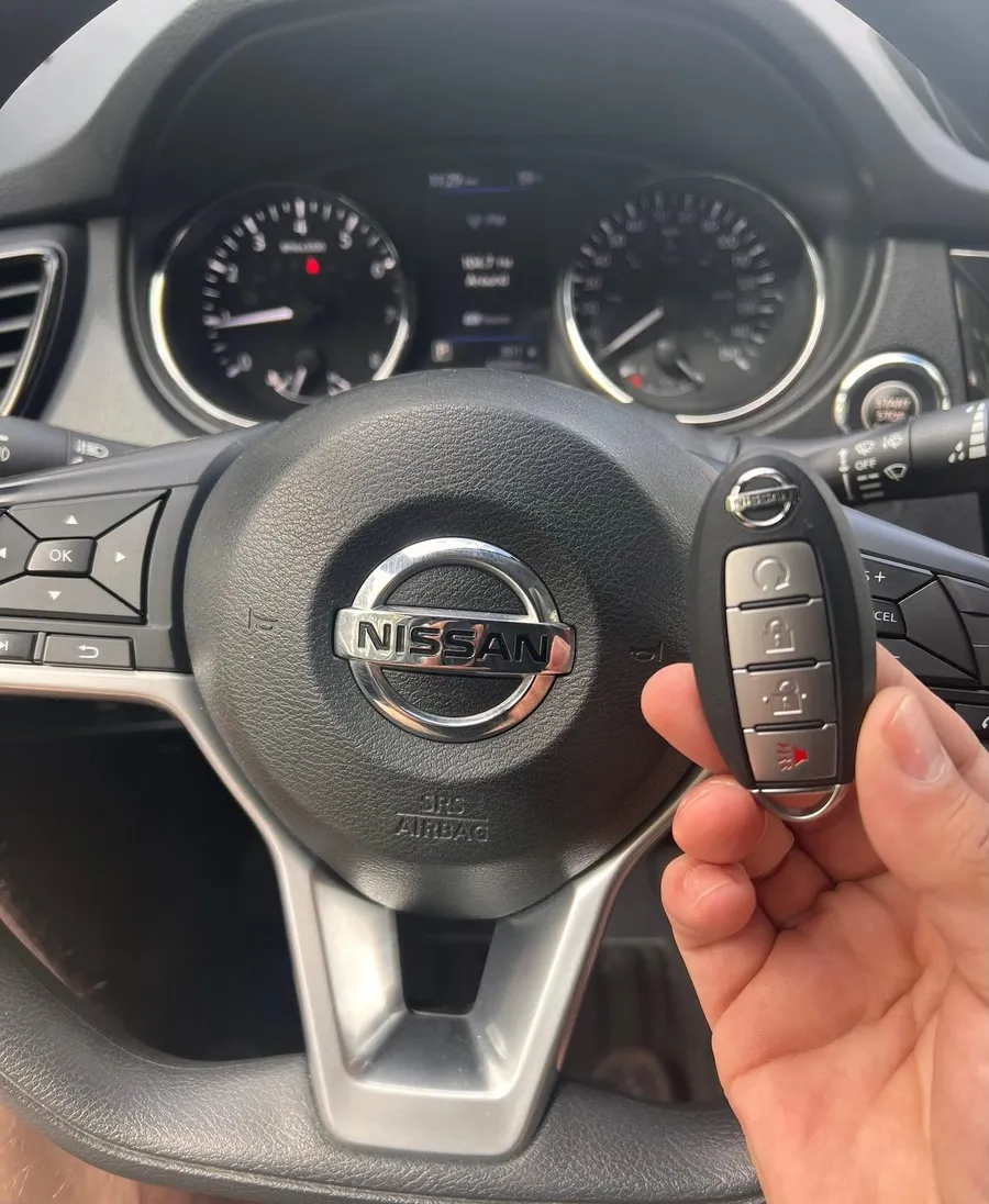 Nissan smart key at the steering wheel