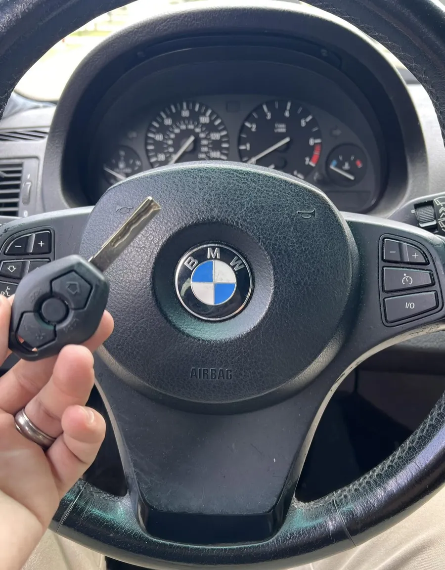 BMW remote key at the steering wheel