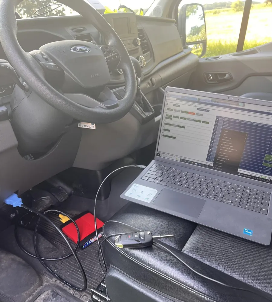Programming a vehicle key with a laptop and diagnostic tools