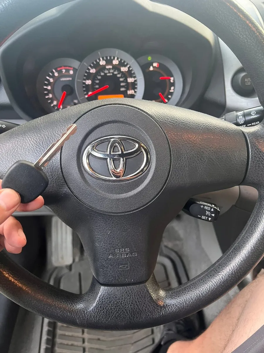 Toyota transponder key at the steering wheel