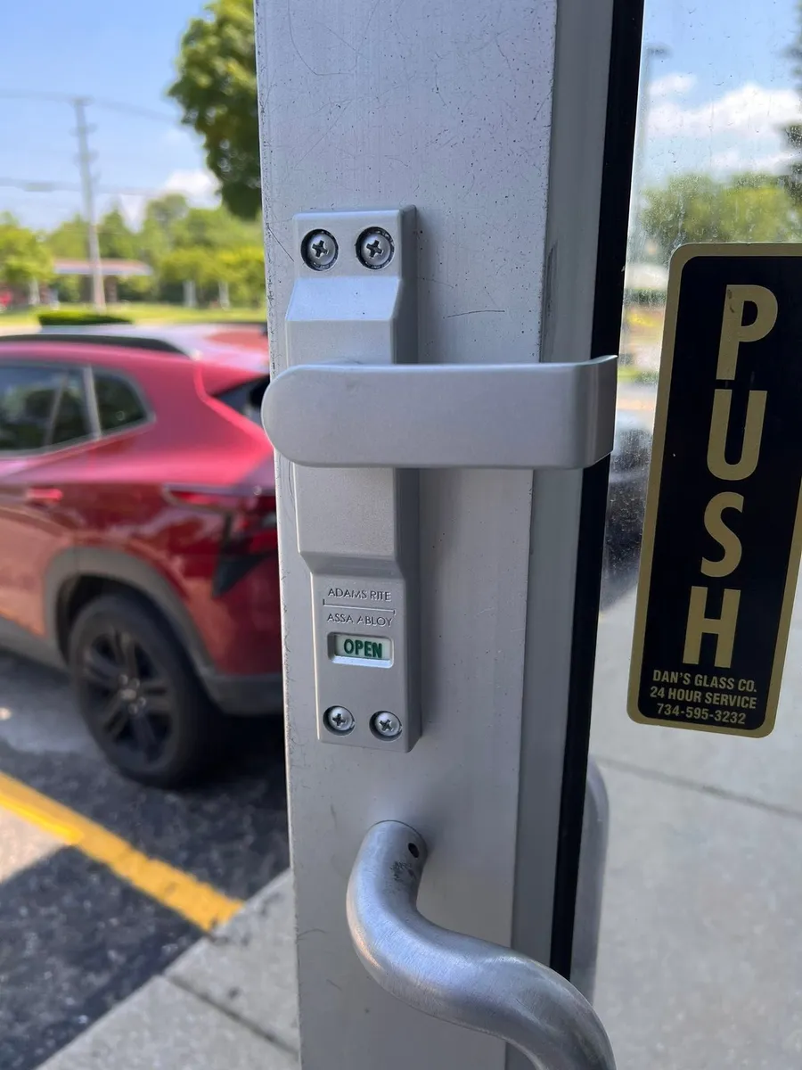 Push hardware on a storefront door