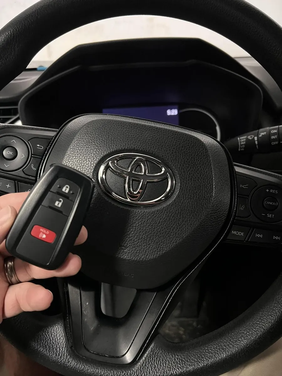 Toyota smart key at the steering wheel