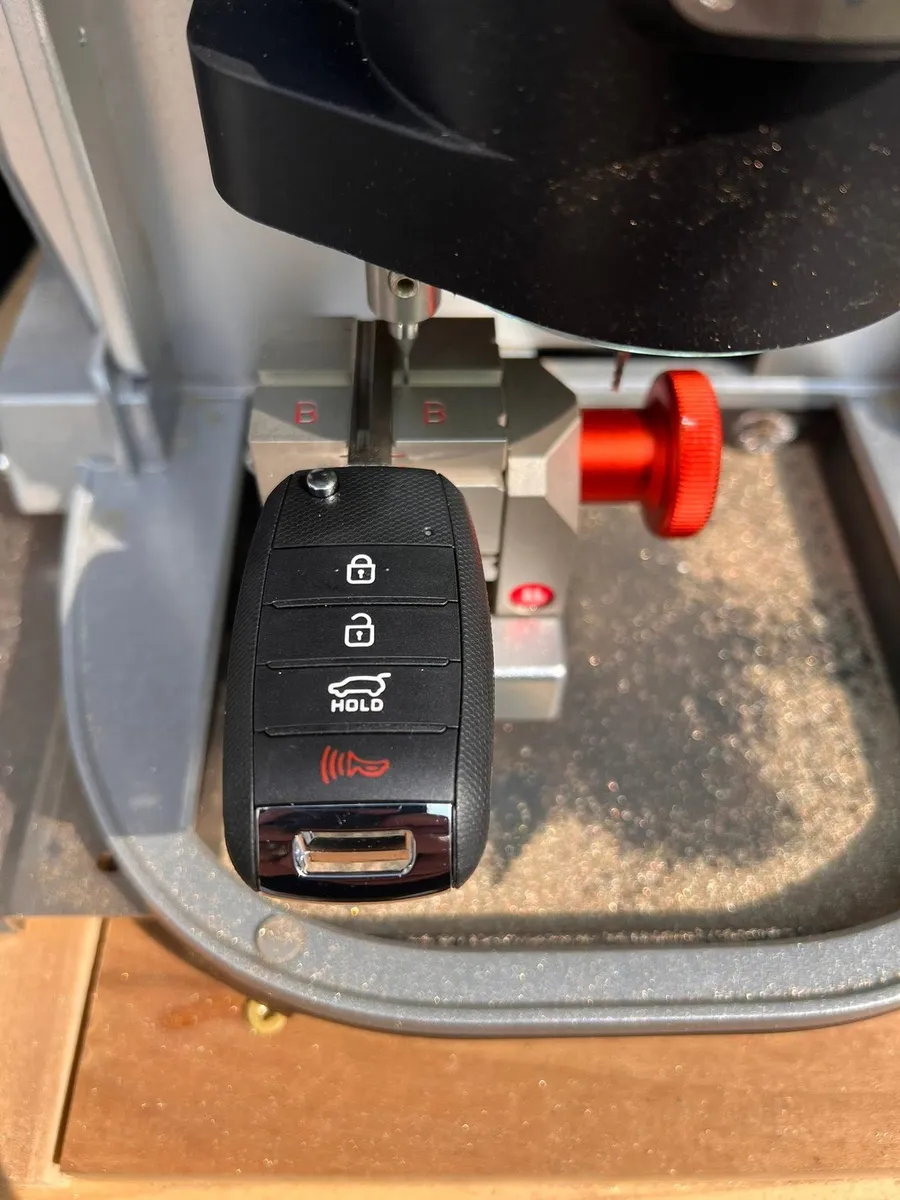 Flip key in a key cutting machine