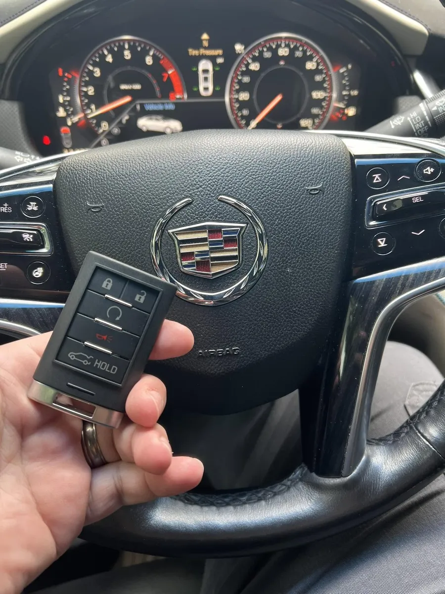 Cadillac smart key at the steering wheel