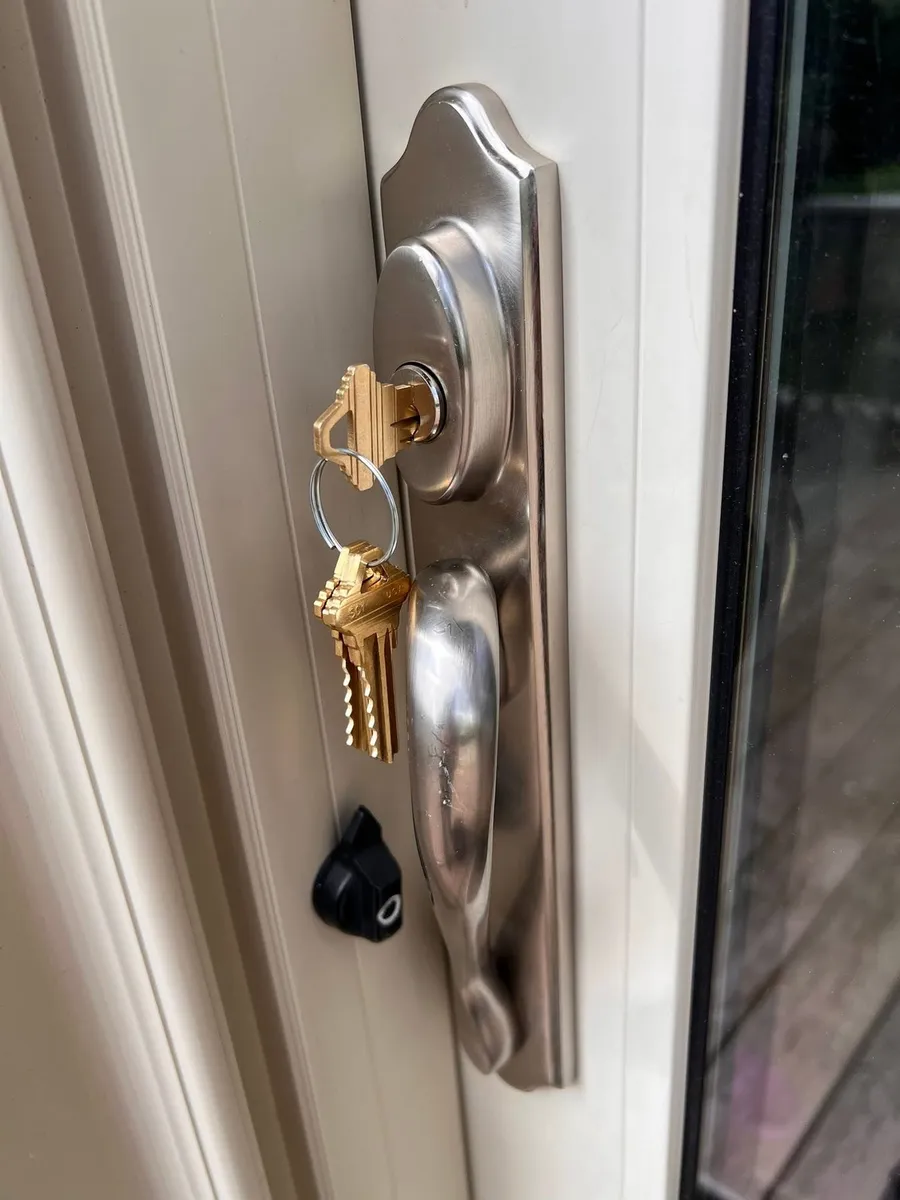Handleset with new keys on a front door