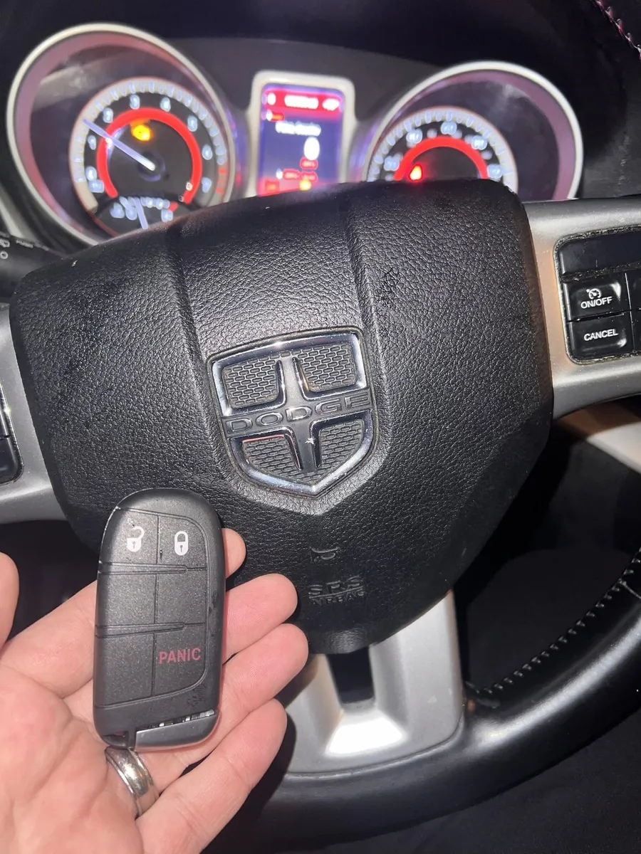 Dodge smart key at the steering wheel