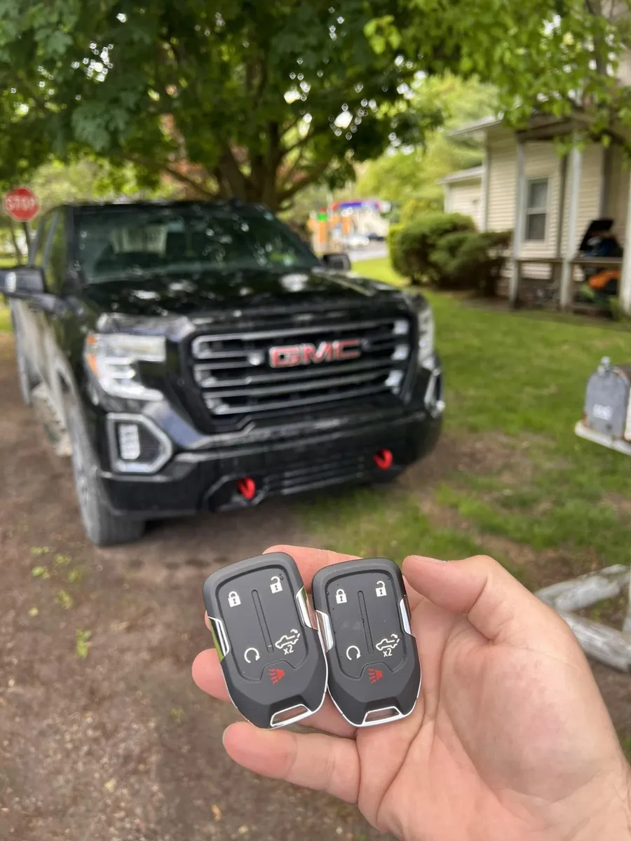 Two smart keys for a black GMC Sierra AT4