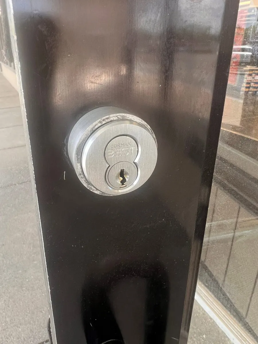 New lock cylinder on a storefront door