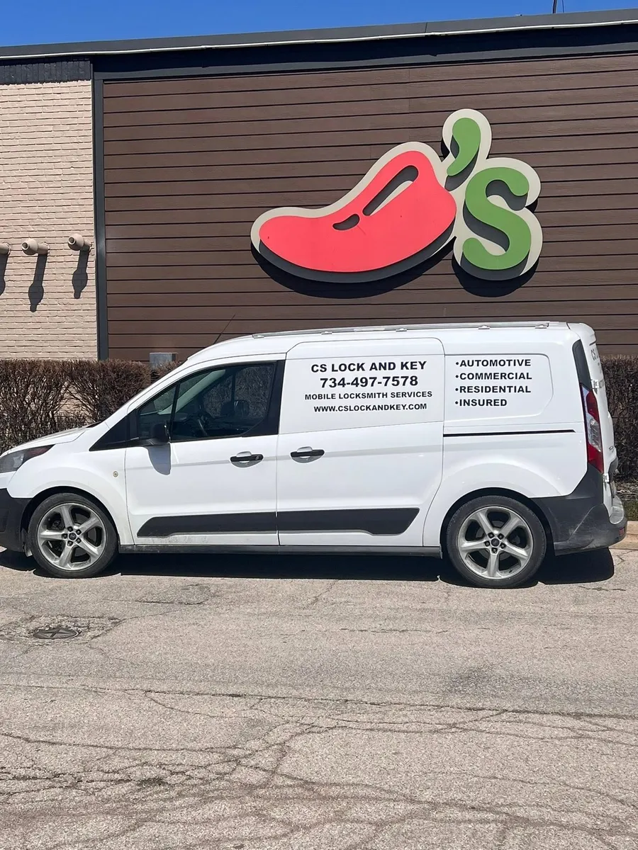 CS Lock and Key van parked at a restaurant