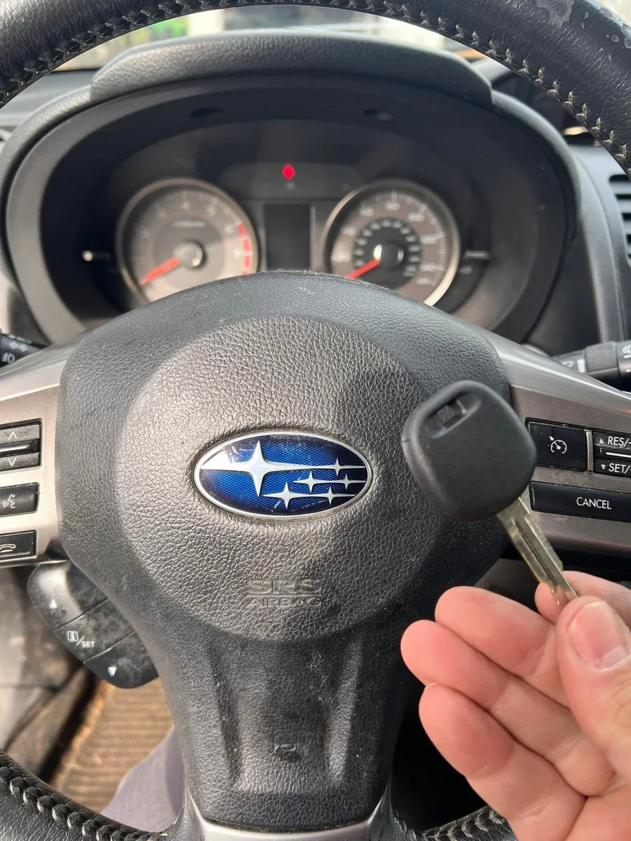 Subaru transponder key at the steering wheel