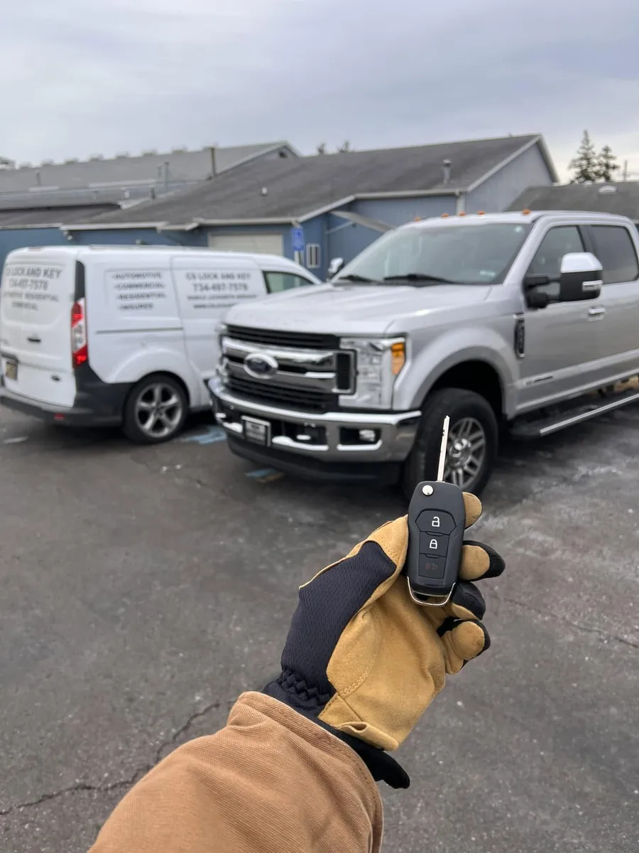 Remote head key for a silver Ford Super Duty, with the CS Lock and Key van