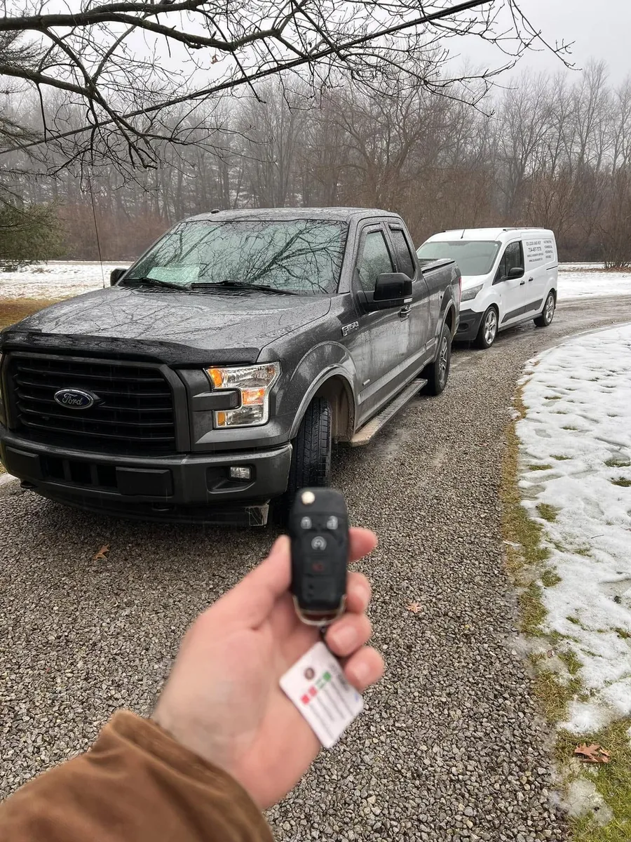 Flip key for a dark Ford F-150, with the CS Lock and Key van
