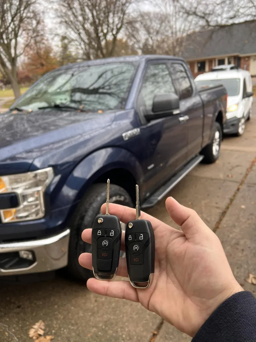 Two flip keys for a blue Ford F-150