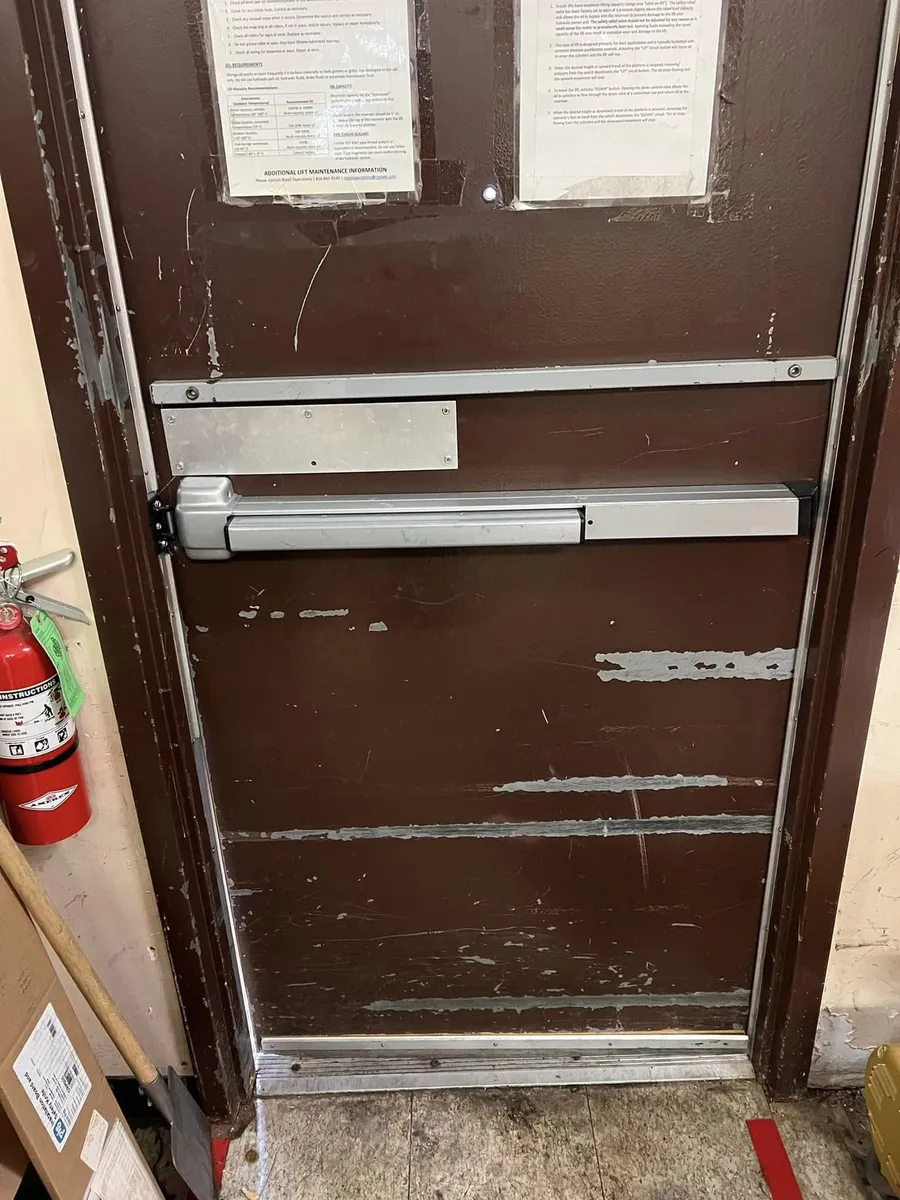 Panic bar on a commercial steel door