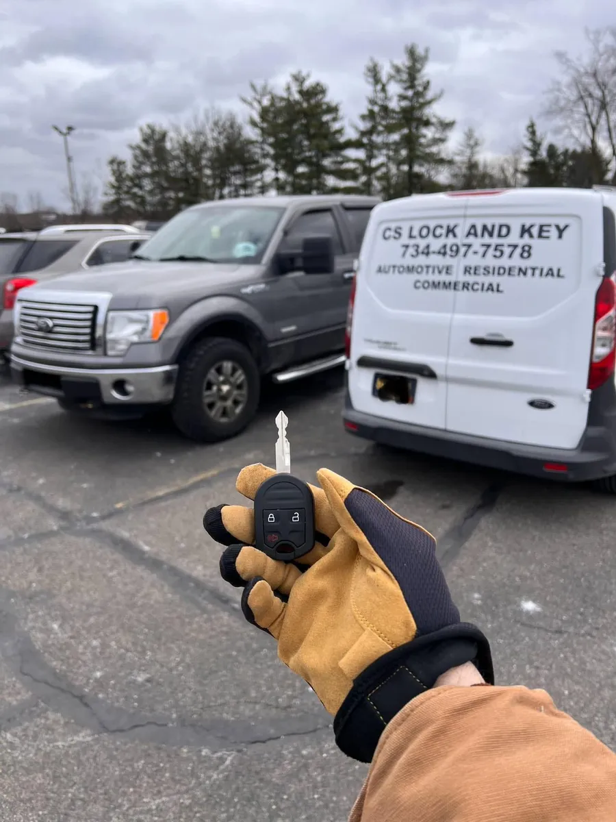 Remote head key for a gray Ford F-150, with the CS Lock and Key van