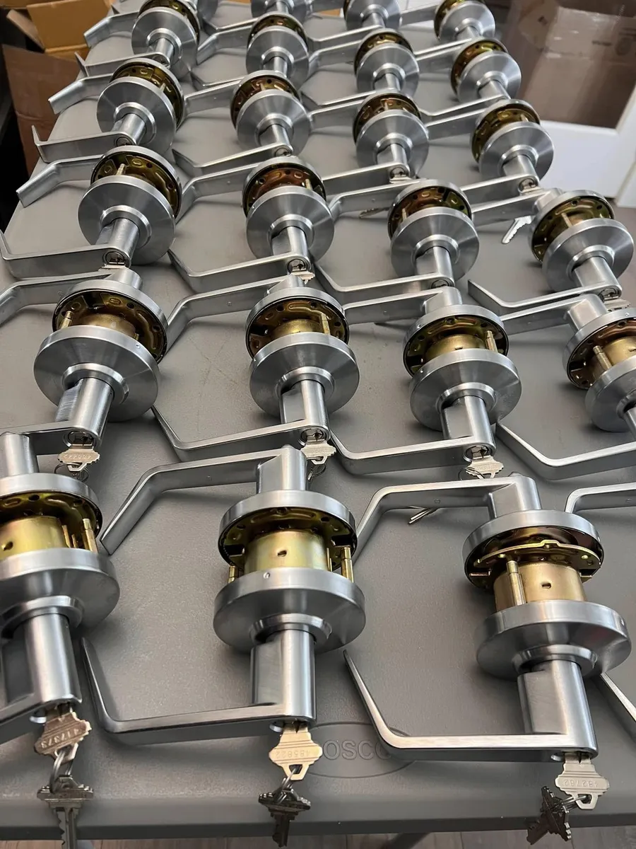 Commercial lever locks with keys laid out on a table