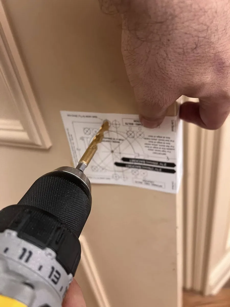 Drilling a door with a deadbolt template
