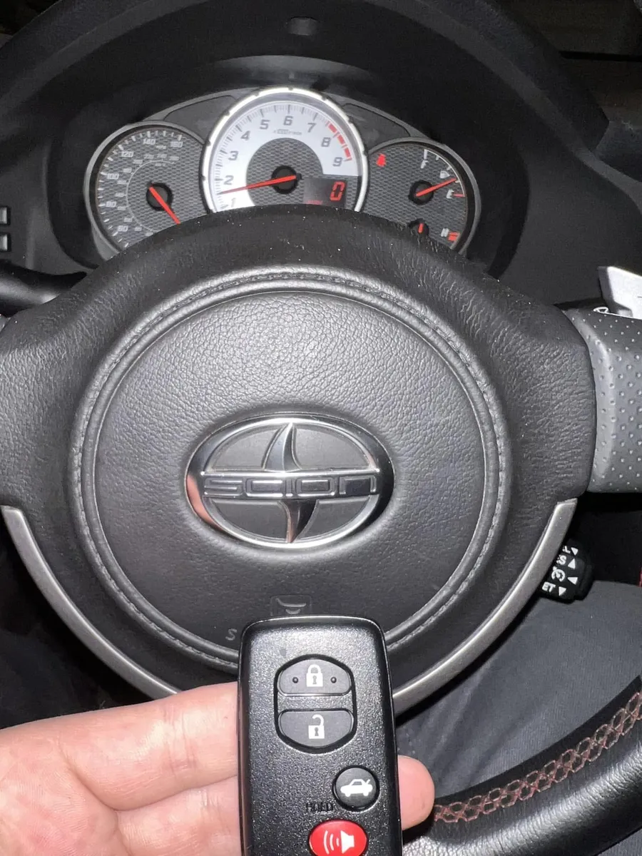 Scion smart key at the steering wheel