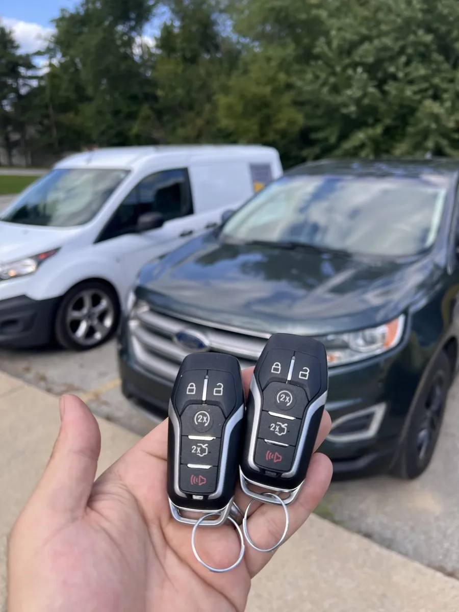 Two smart keys for a Ford Edge, with the CS Lock and Key van