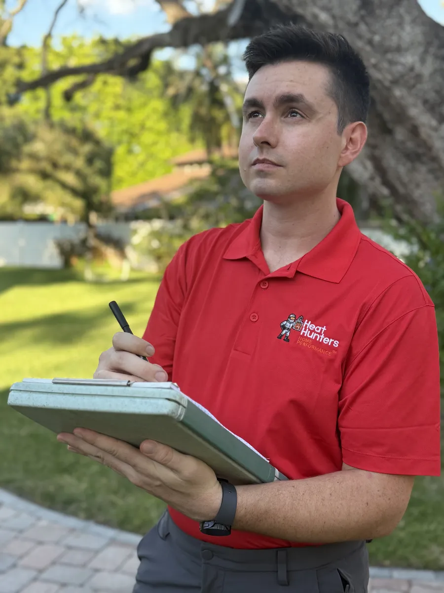 Heat Hunters measuring attic insulation depth