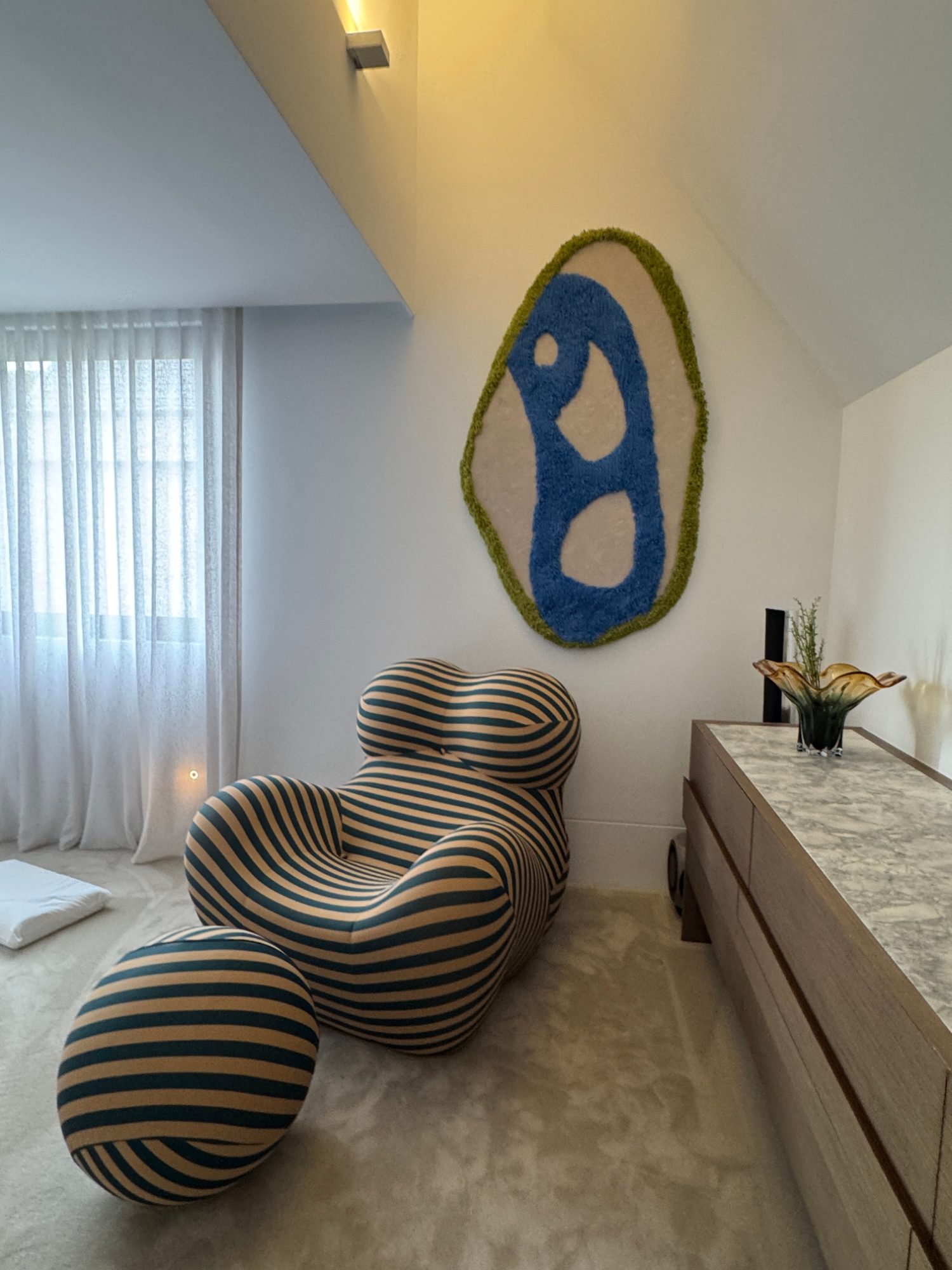 Upstairs sitting area with feature artwork