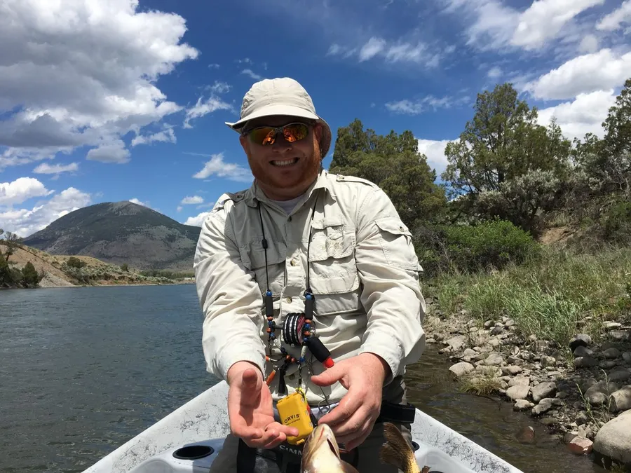 Chris fly fishing on a mountain river